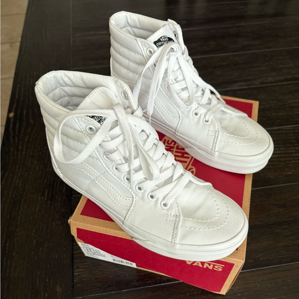 high top white vans.